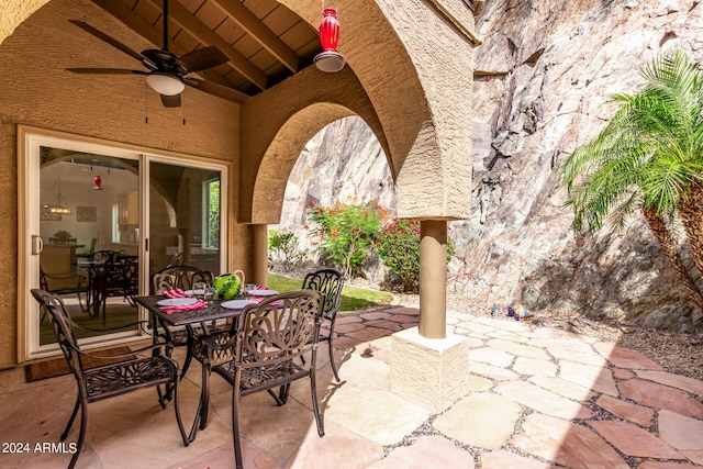 view of patio featuring ceiling fan