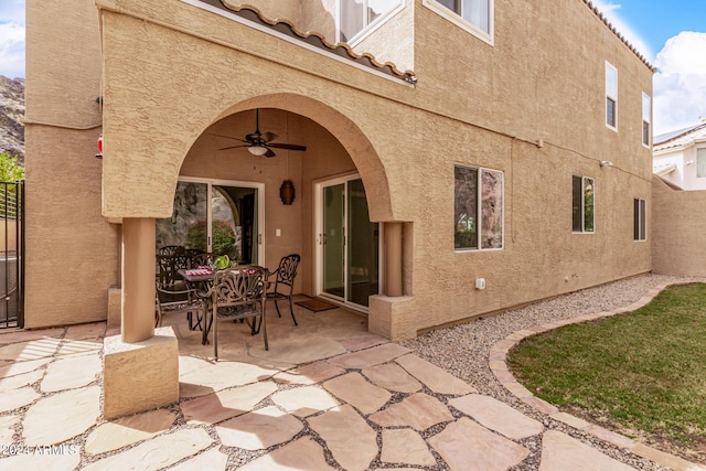 exterior space featuring a patio and ceiling fan