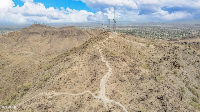 birds eye view of property with a mountain view