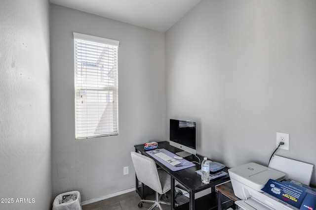 office space with baseboards