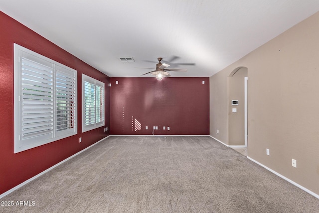 unfurnished room with light carpet and ceiling fan