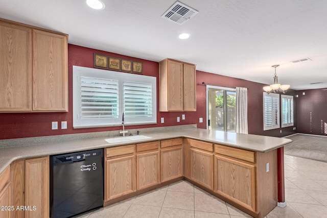 kitchen featuring kitchen peninsula, sink, a notable chandelier, black dishwasher, and hanging light fixtures