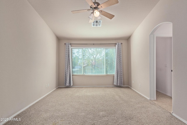 carpeted empty room with ceiling fan