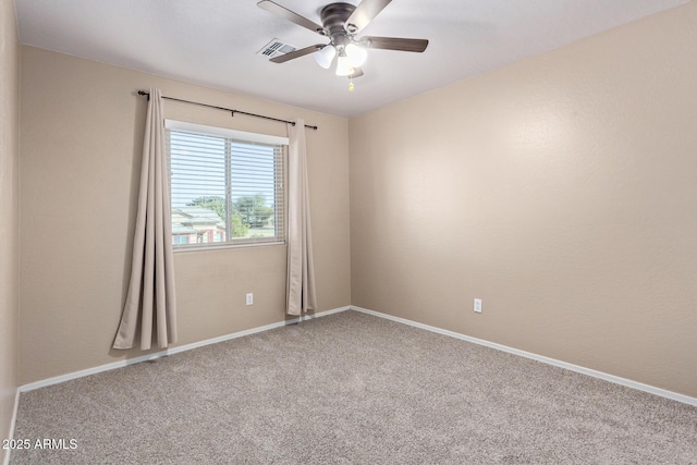 carpeted empty room with ceiling fan