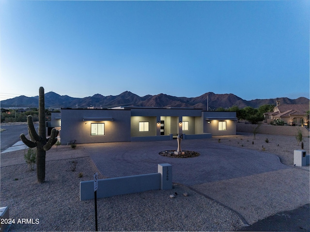 view of front of property with a mountain view