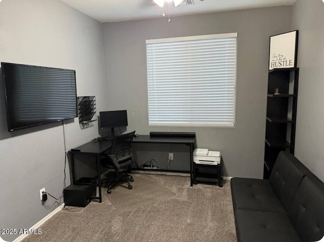 office with ceiling fan and carpet floors