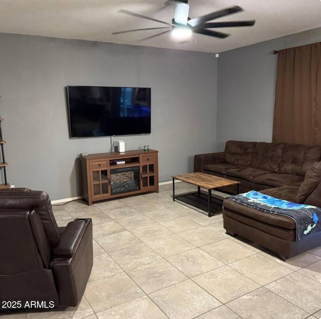 tiled living room with ceiling fan