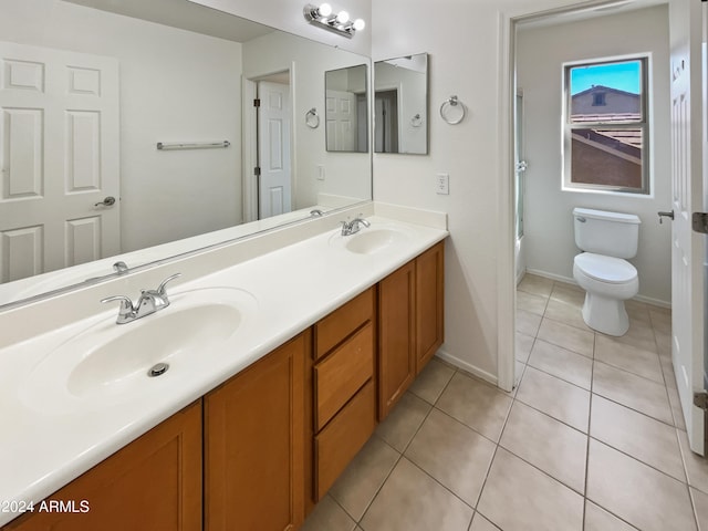 full bathroom with tub / shower combination, toilet, tile patterned flooring, and vanity