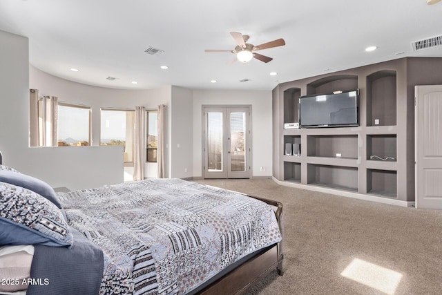 bedroom featuring ceiling fan, carpet, and french doors