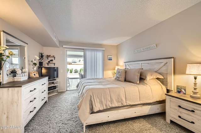 carpeted bedroom with a textured ceiling, visible vents, and access to exterior