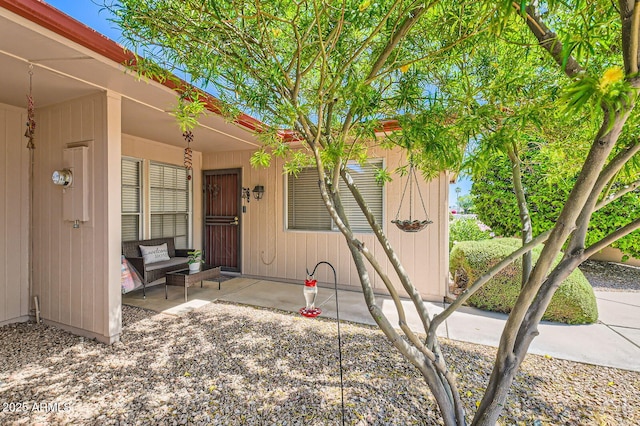 doorway to property featuring covered porch