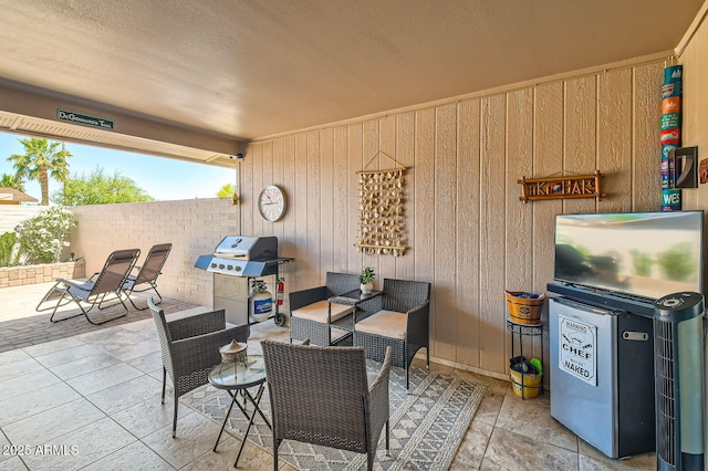 view of patio / terrace with fence and grilling area