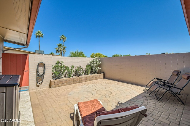 view of patio featuring a fenced backyard