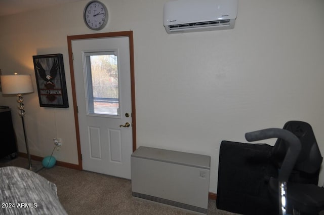 doorway with a wall unit AC, carpet flooring, and baseboards