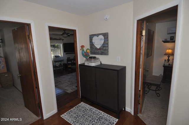 entrance foyer featuring dark wood-style floors and baseboards