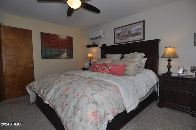 bedroom with carpet floors, a wall mounted air conditioner, and a ceiling fan
