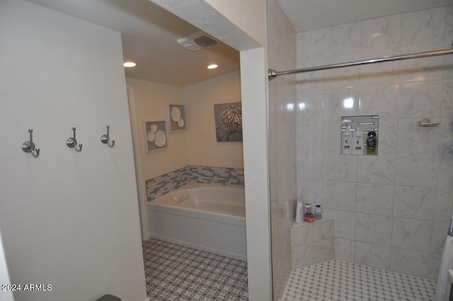 full bath with a shower stall and a bath