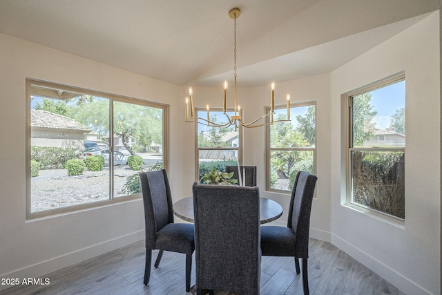 4248 E Jason Dr, Phoenix, AZ 85050 - dining room featuring a chandelier, baseboards, and healthy amount of natural light