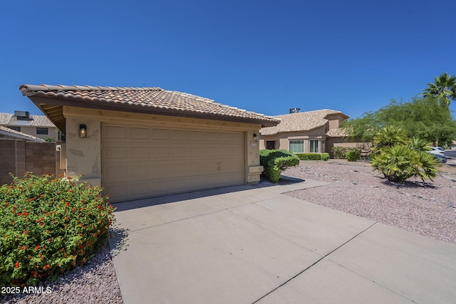 4248 E Jason Dr, Phoenix, AZ 85050 - single story home with stucco siding, a tile roof, and driveway