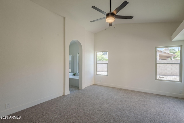 4248 E Jason Dr, Phoenix, AZ 85050 - unfurnished room with plenty of natural light, arched walkways, light carpet, vaulted ceiling, and a ceiling fan