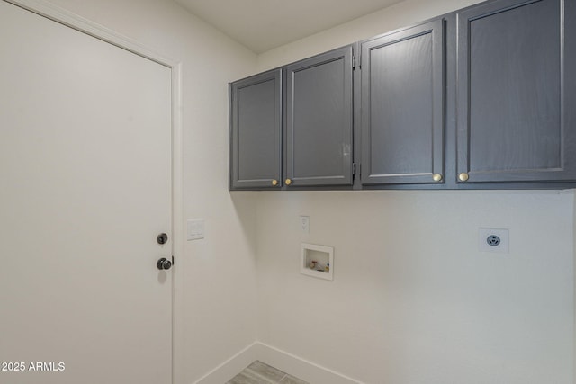 4248 E Jason Dr, Phoenix, AZ 85050 - washroom featuring cabinet space, hookup for a washing machine, hookup for an electric dryer, and baseboards