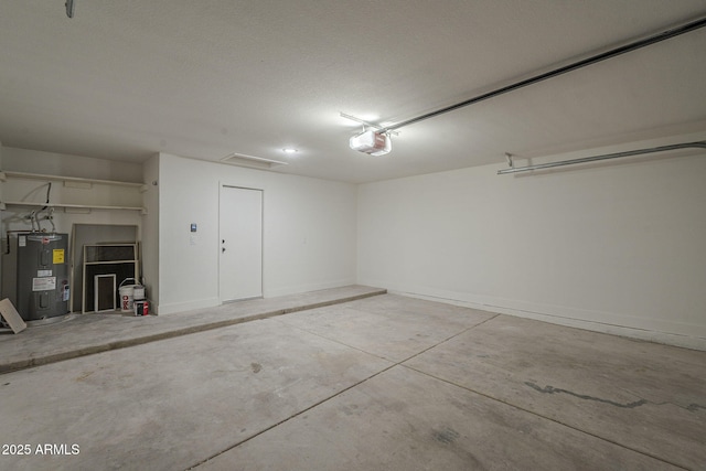4248 E Jason Dr, Phoenix, AZ 85050 - garage with water heater and a garage door opener