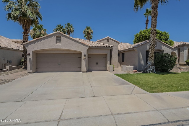 1826 W Oriole Way, Chandler, AZ 85286 - mediterranean / spanish house featuring stucco siding, a garage, driveway, a front lawn, and a tile roof