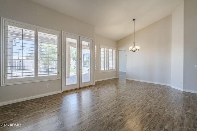 1826 W Oriole Way, Chandler, AZ 85286 - unfurnished room featuring a chandelier, dark wood-style floors, lofted ceiling, and french doors