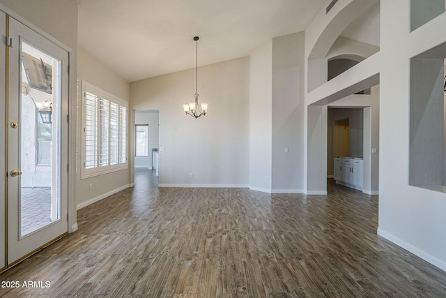 1826 W Oriole Way, Chandler, AZ 85286 - unfurnished room featuring a chandelier, dark wood-style flooring, and a high ceiling