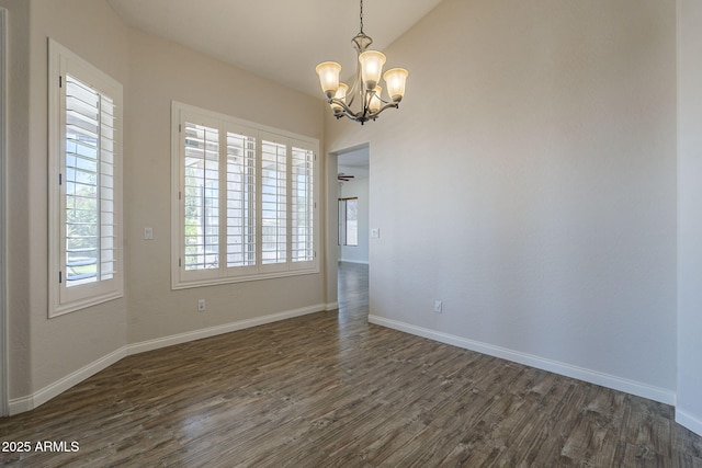 1826 W Oriole Way, Chandler, AZ 85286 - empty room featuring a chandelier, dark wood-type flooring, and vaulted ceiling