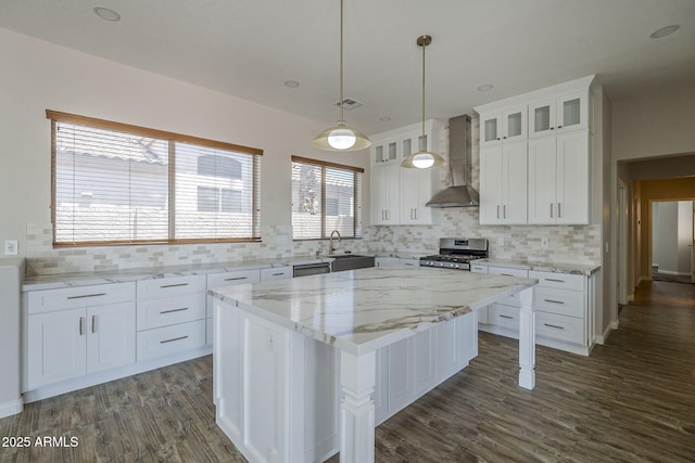 1826 W Oriole Way, Chandler, AZ 85286 - kitchen featuring wall chimney exhaust hood, stainless steel appliances, white cabinets, glass insert cabinets, and decorative backsplash