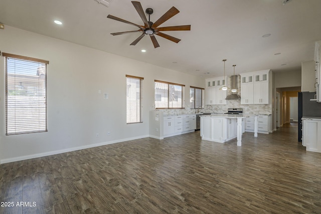 1826 W Oriole Way, Chandler, AZ 85286 - unfurnished living room featuring ceiling fan, dark wood-style flooring, and recessed lighting