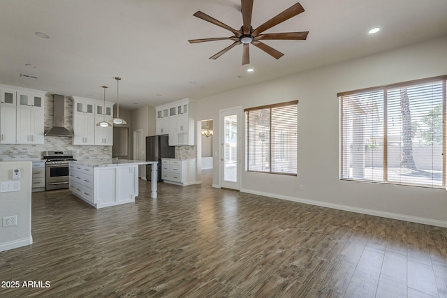 1826 W Oriole Way, Chandler, AZ 85286 - kitchen featuring wall chimney range hood, appliances with stainless steel finishes, open floor plan, a ceiling fan, and recessed lighting