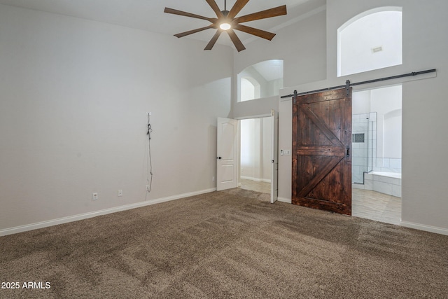 1826 W Oriole Way, Chandler, AZ 85286 - carpeted spare room with a ceiling fan, high vaulted ceiling, and a barn door