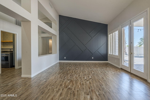 1826 W Oriole Way, Chandler, AZ 85286 - unfurnished room featuring wood finished floors, a decorative wall, and french doors