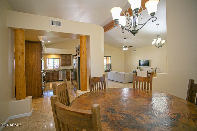 dining room with vaulted ceiling and ceiling fan with notable chandelier