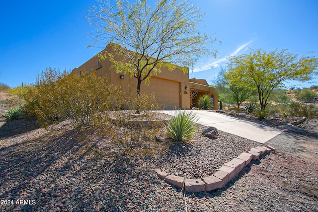 view of home's exterior featuring a garage