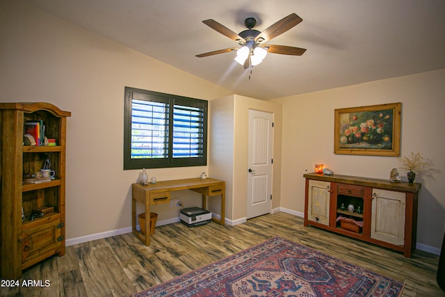 miscellaneous room with ceiling fan, vaulted ceiling, and hardwood / wood-style floors