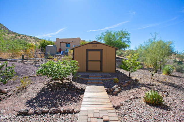 view of outbuilding featuring a mountain view