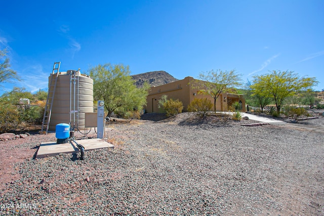 exterior space featuring a mountain view