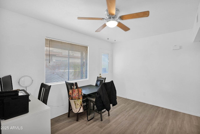 office with ceiling fan and wood finished floors