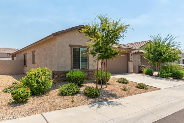 view of front of property featuring a garage