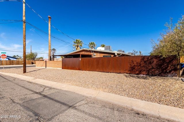 exterior space with a fenced front yard