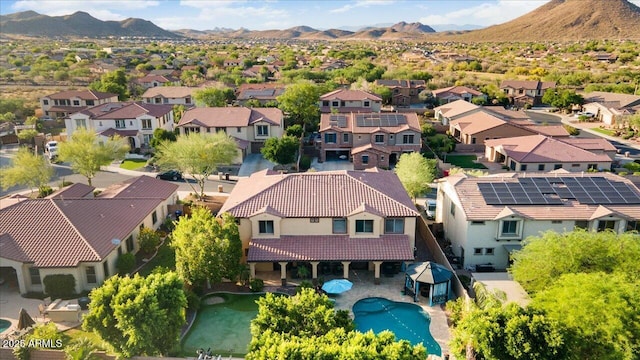 drone / aerial view featuring a mountain view