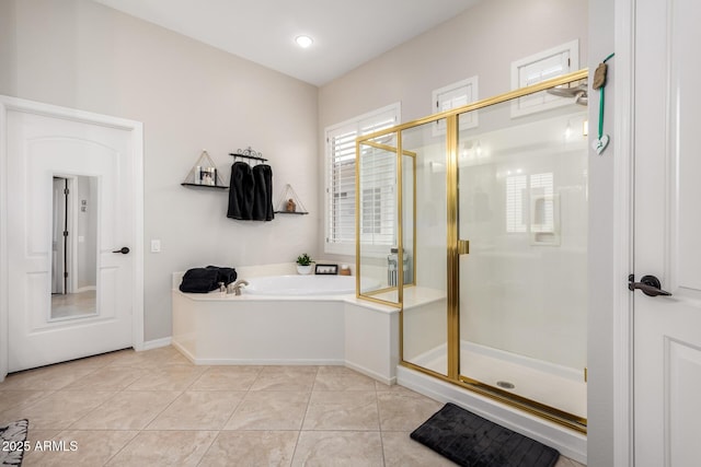 bathroom featuring baseboards, tile patterned floors, a bath, and a shower stall