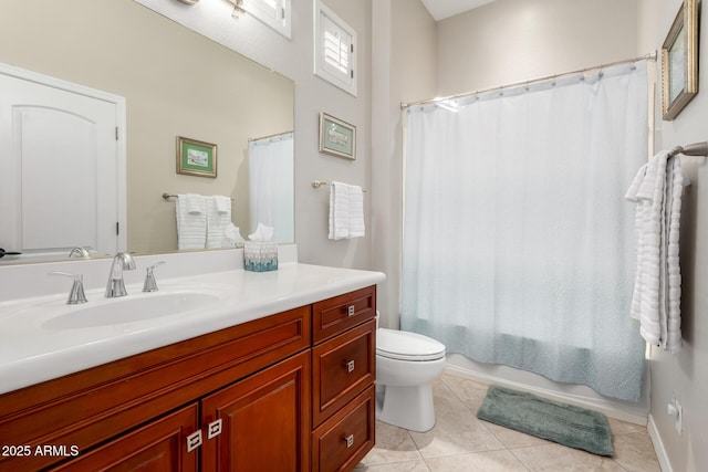 bathroom featuring tile patterned floors, vanity, toilet, and shower / tub combo with curtain