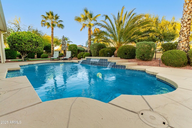 view of swimming pool with a fenced in pool, a patio, and a fenced backyard