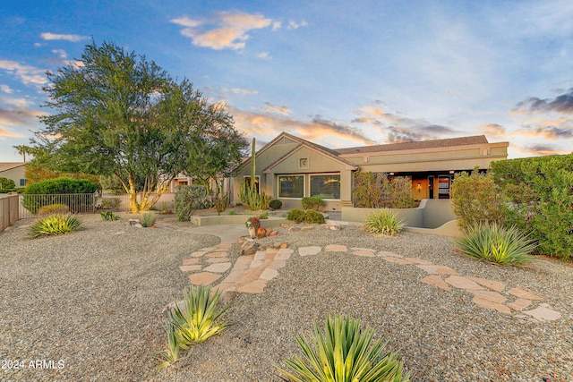 view of front of house with a patio area