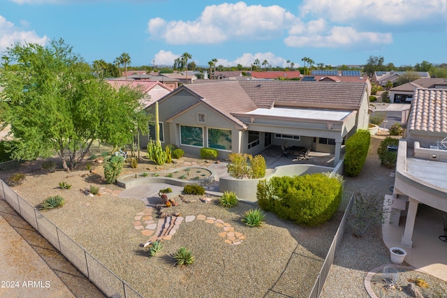 rear view of house with a patio