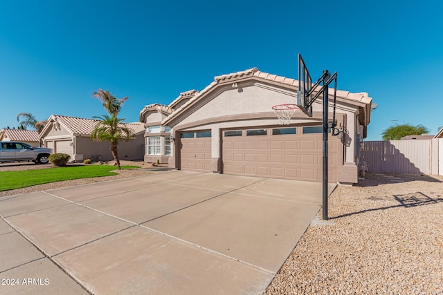 view of front of home featuring a garage